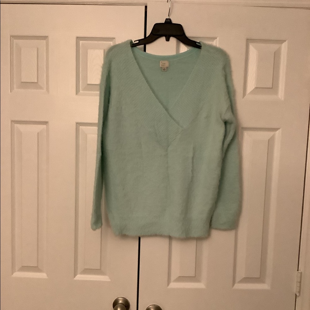 A new day sweater